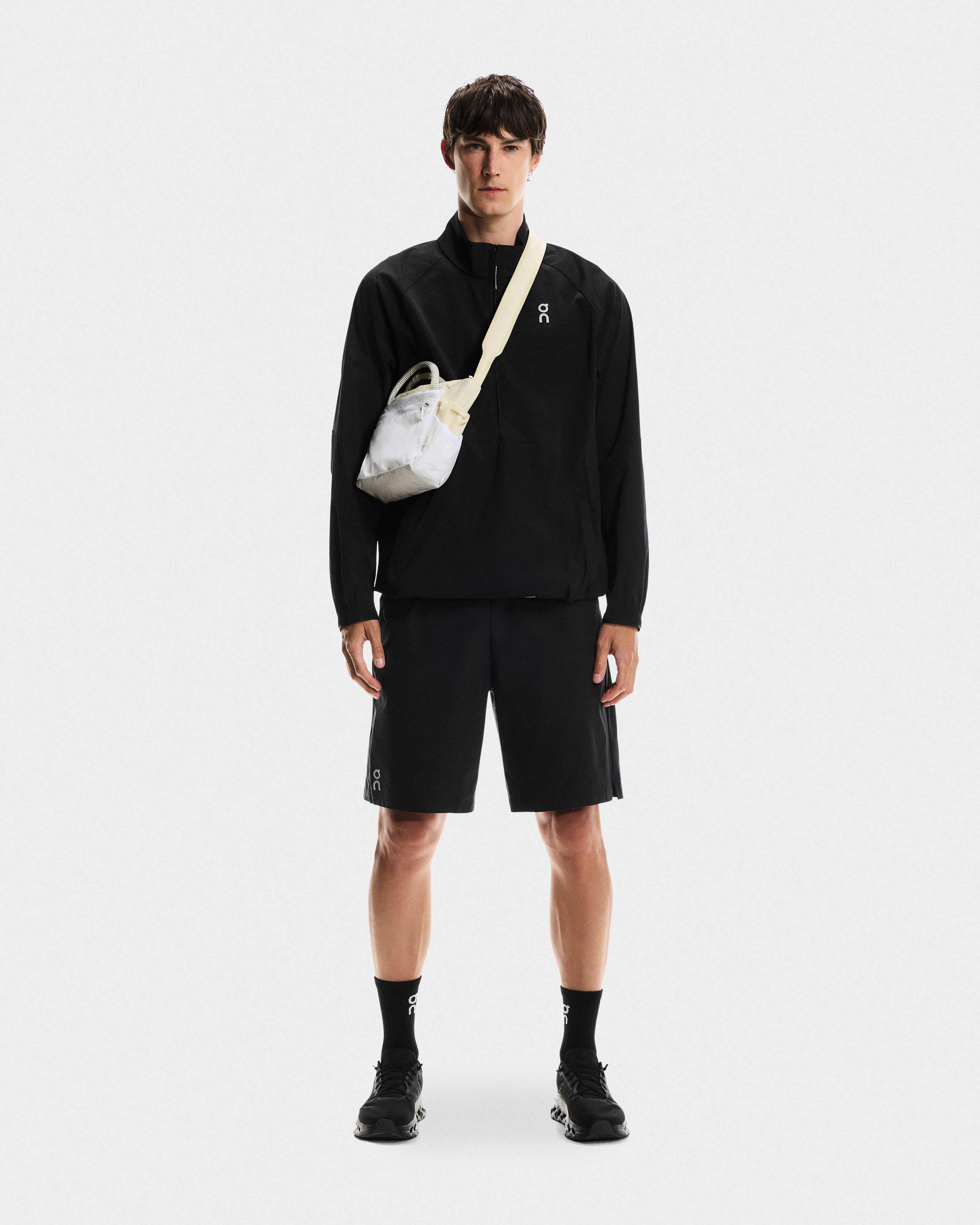 On Track Pack Mini Elite Cream & White Unisex Bags