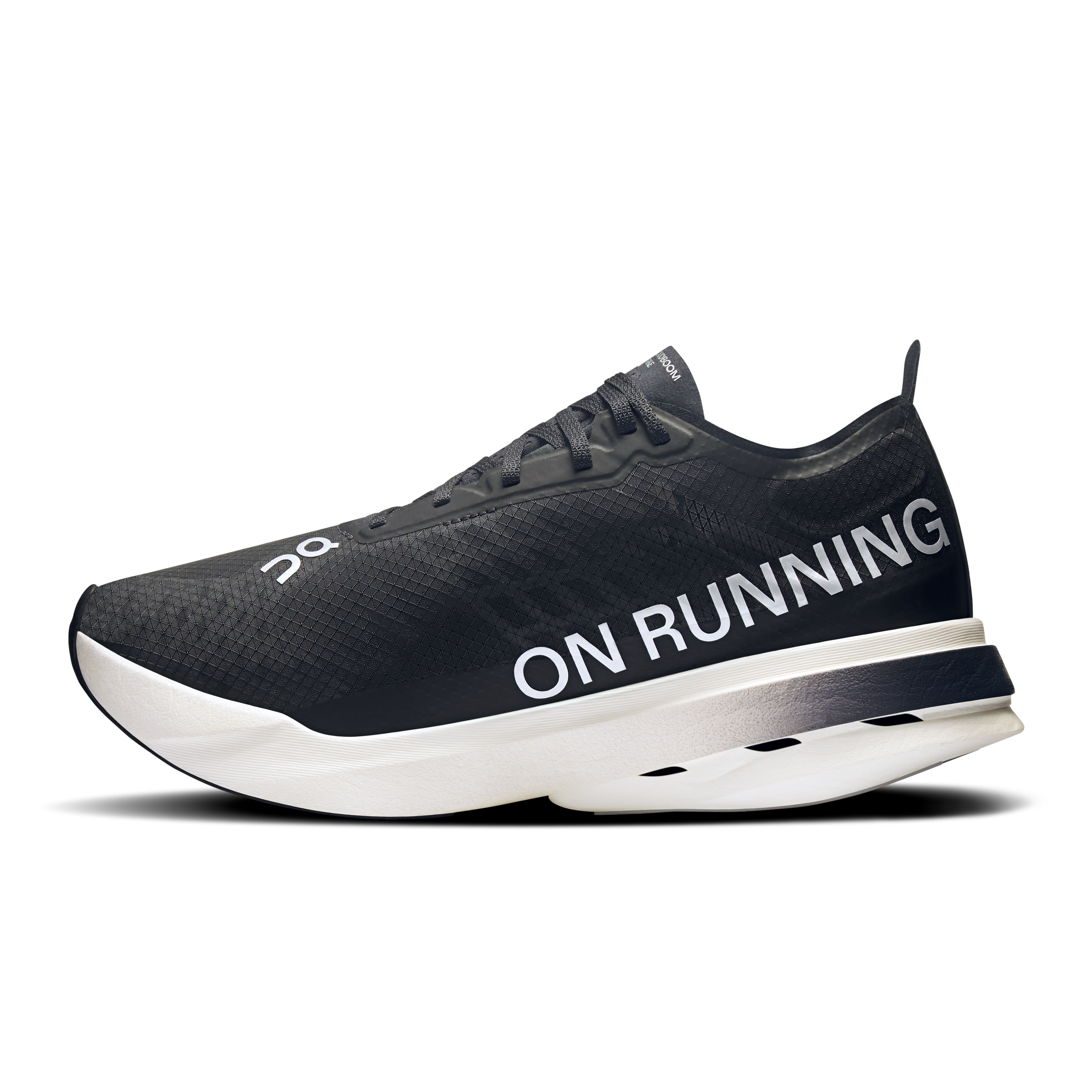 On Cloudboom Strike Black & White Women Road running Shoes