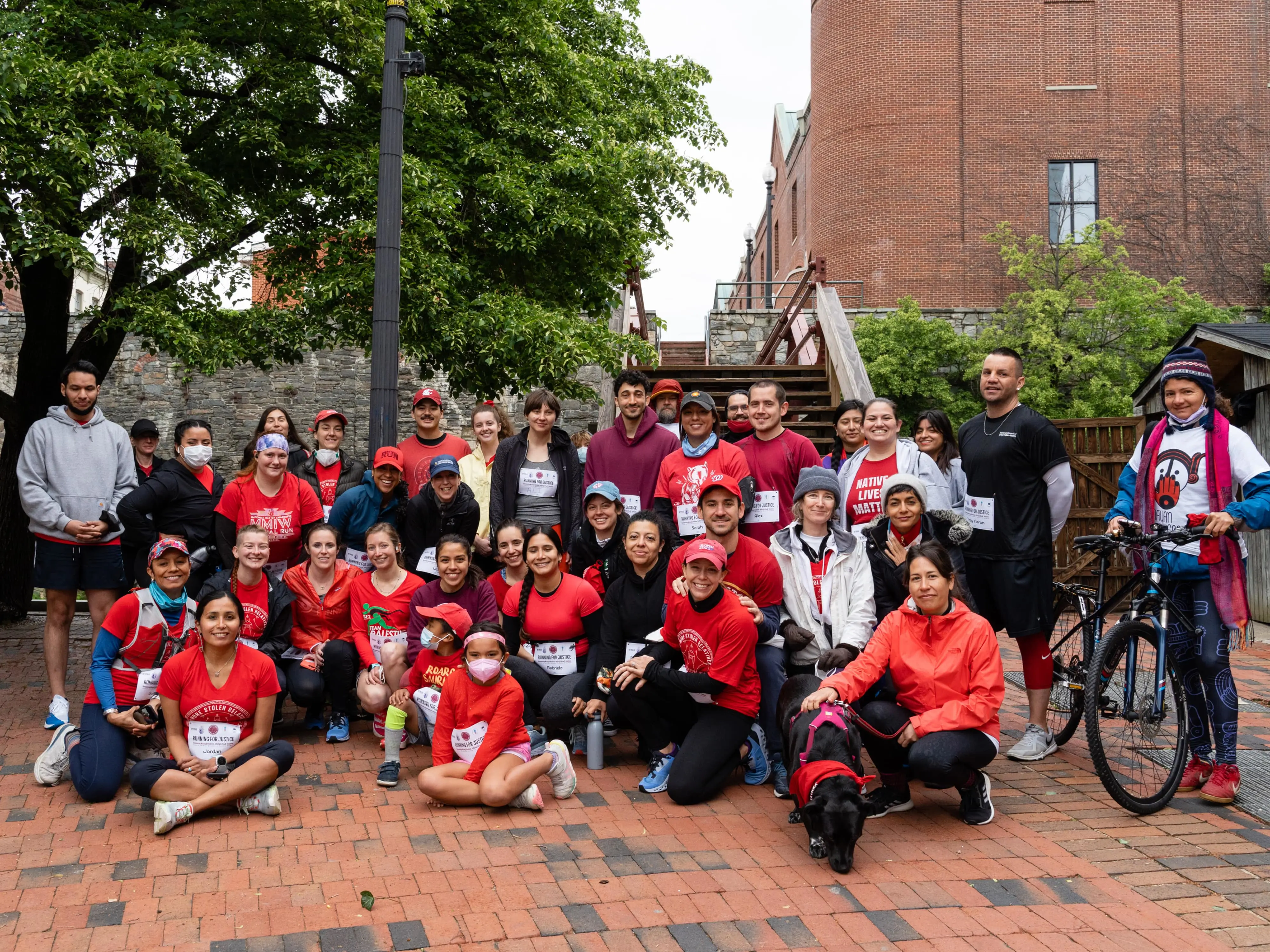 group of people wearing red shirts