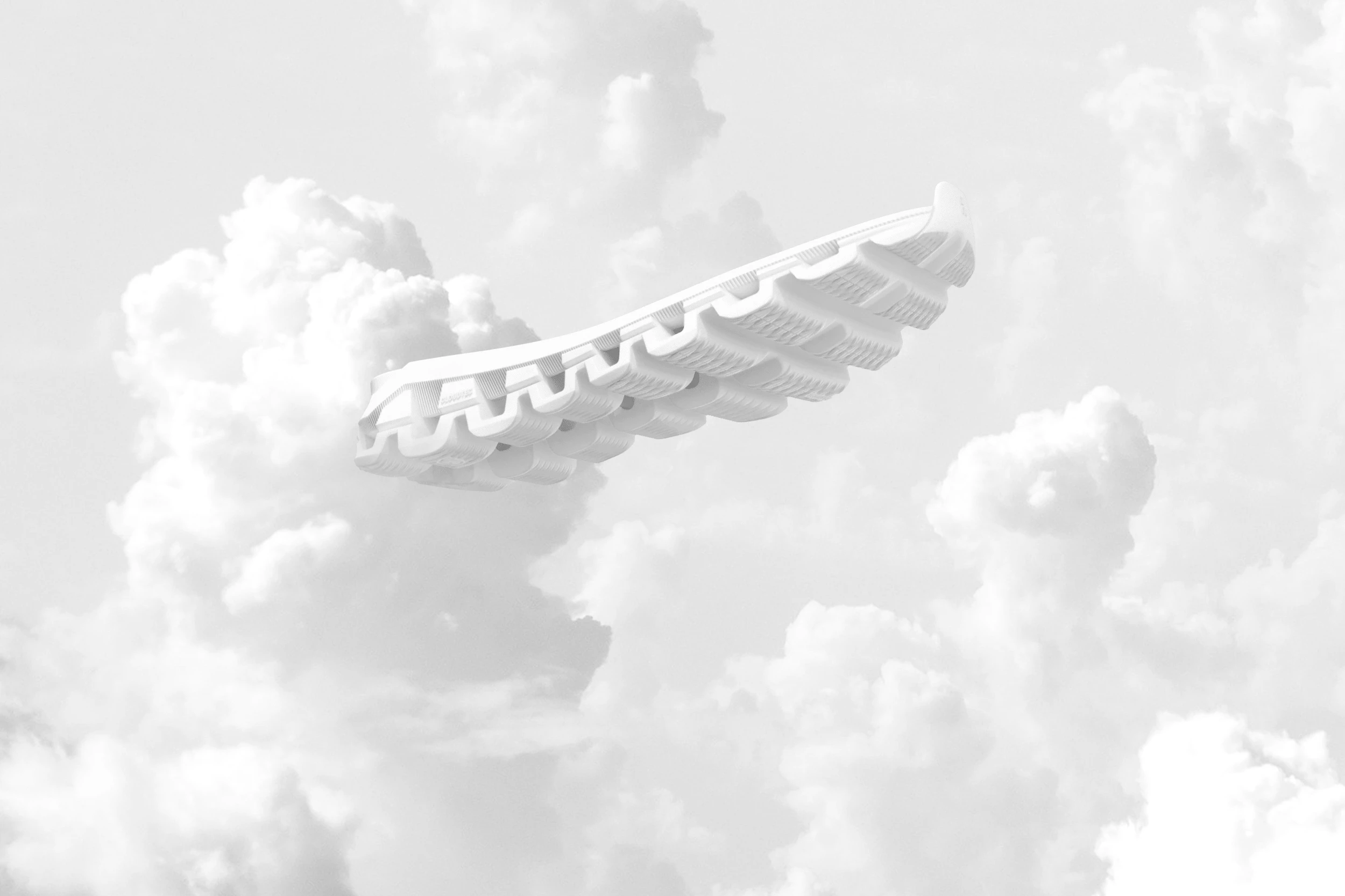A white CloudTec midsole floating against a bright, cloudy backdrop.
