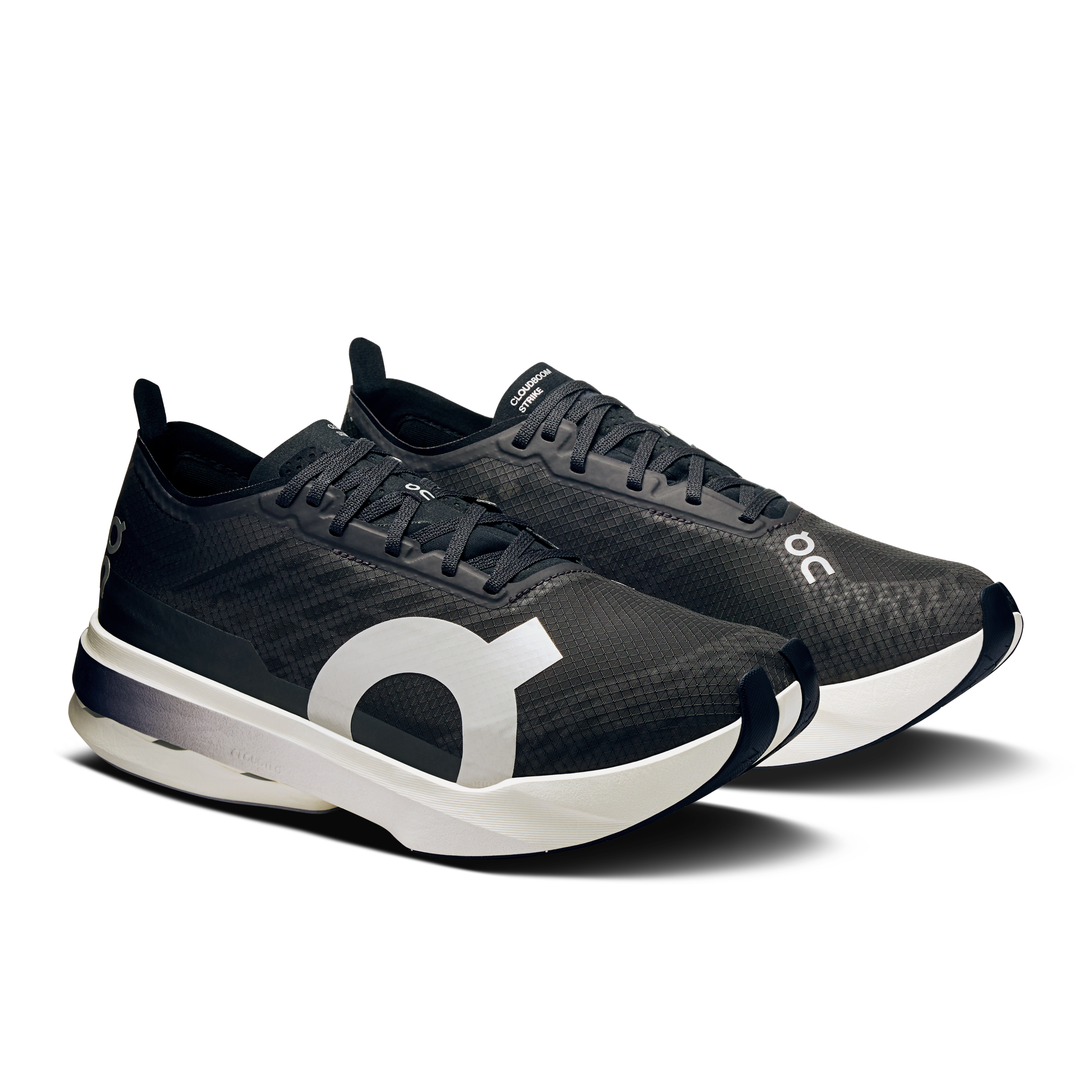 On Cloudboom Strike Black & White Women Road running Shoes