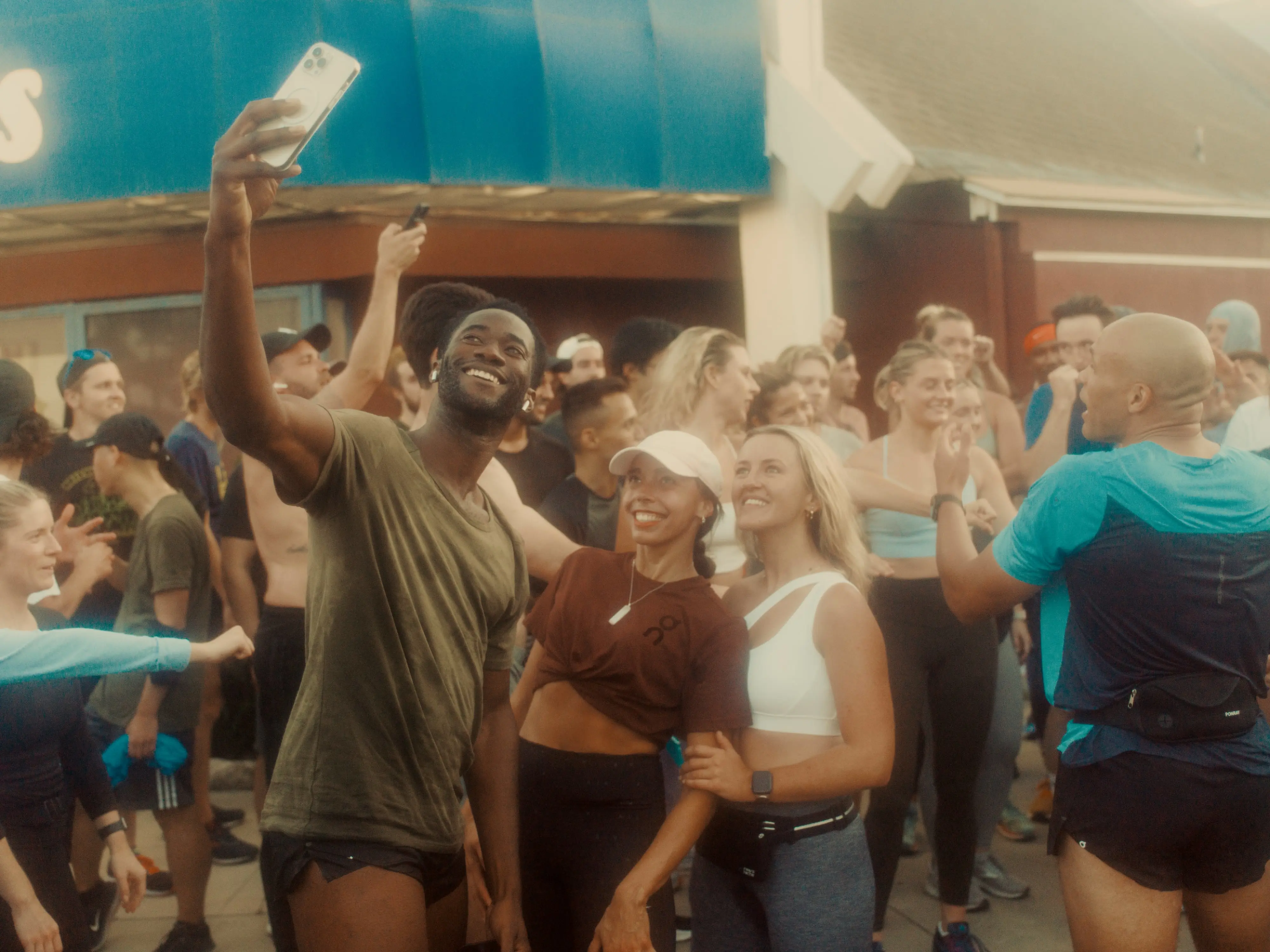 three runners taking a selfie