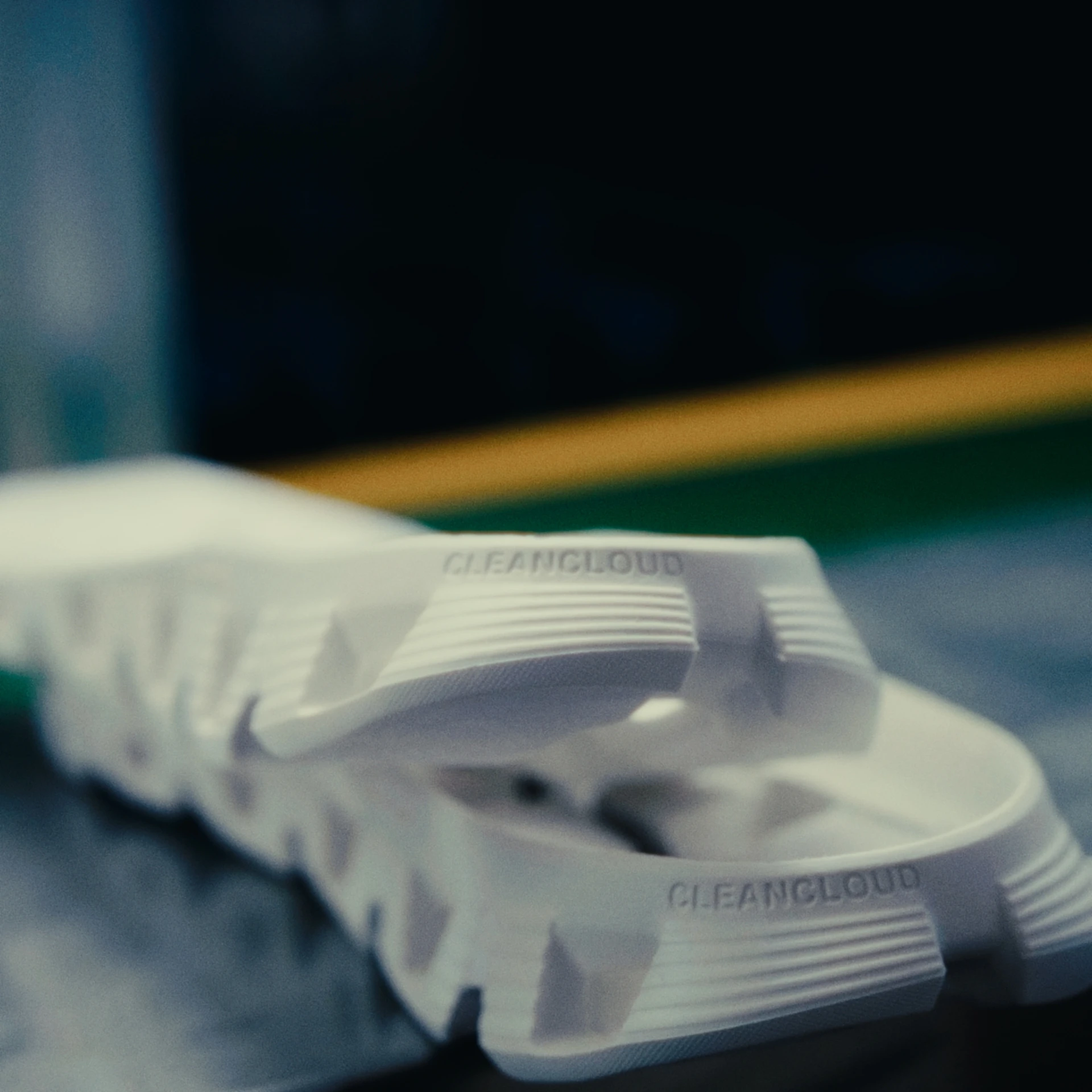 Close-up view of the Cloudprime's midsole, showing detail of the rounded shape and ridged texture.