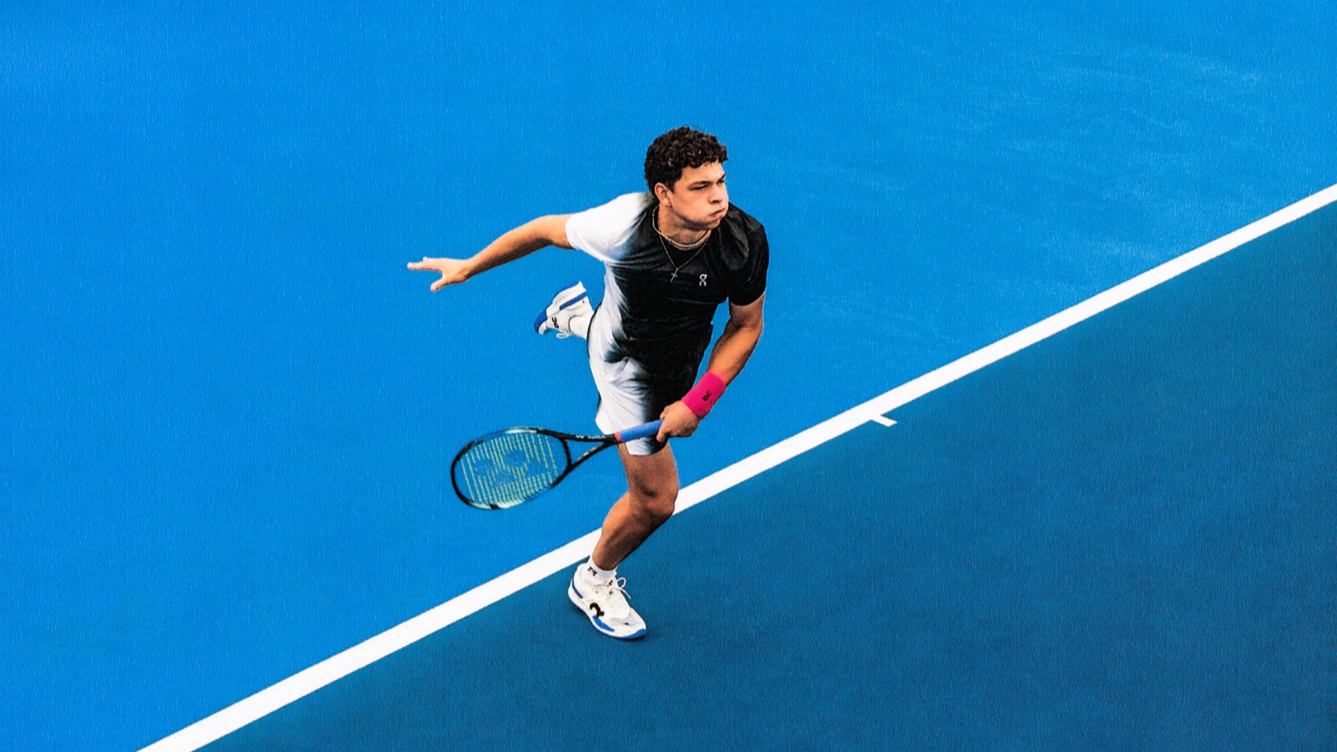 Ben Shelton follows-through on his tennis forehand swing. 