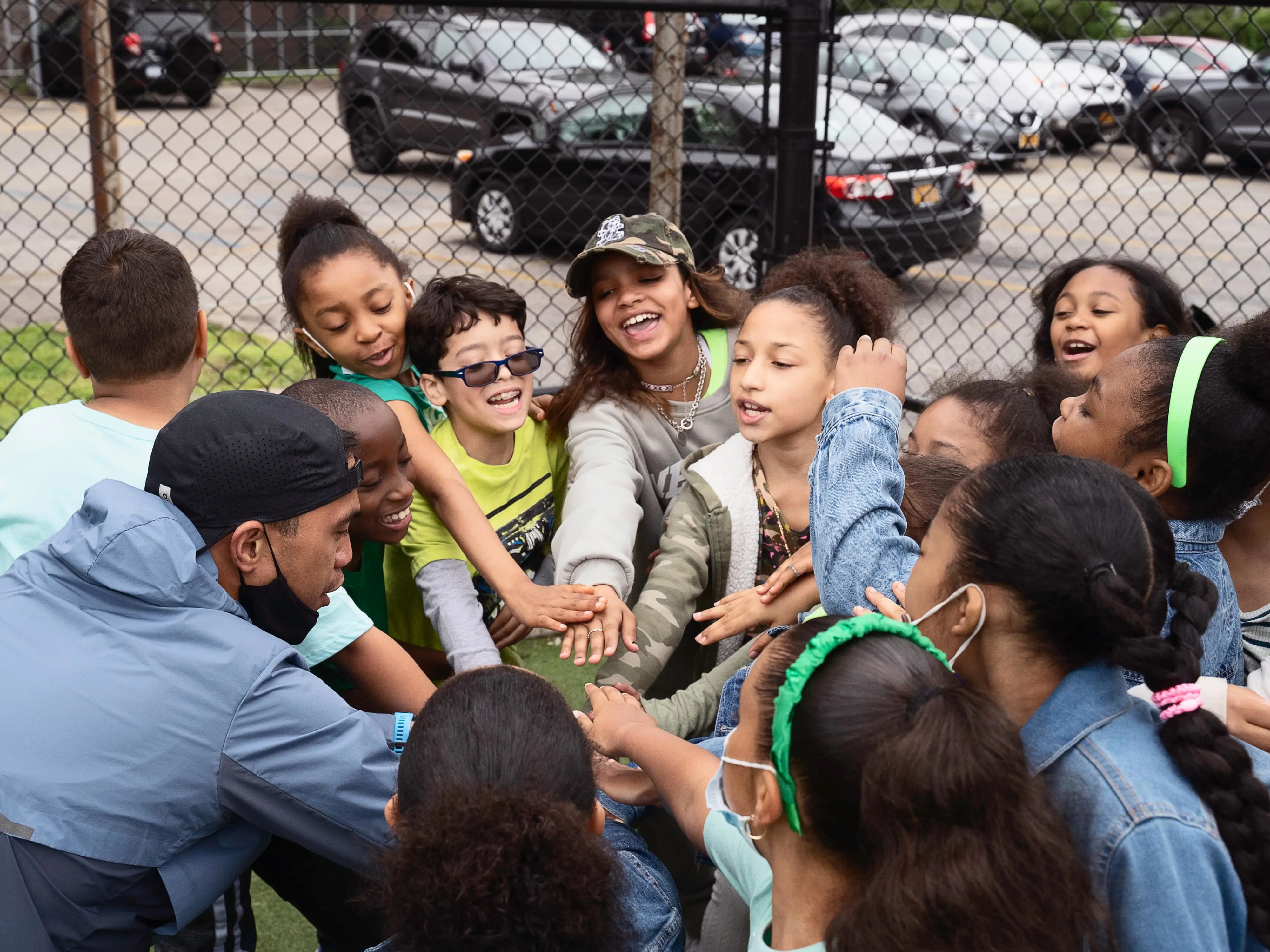 school children in a huddle